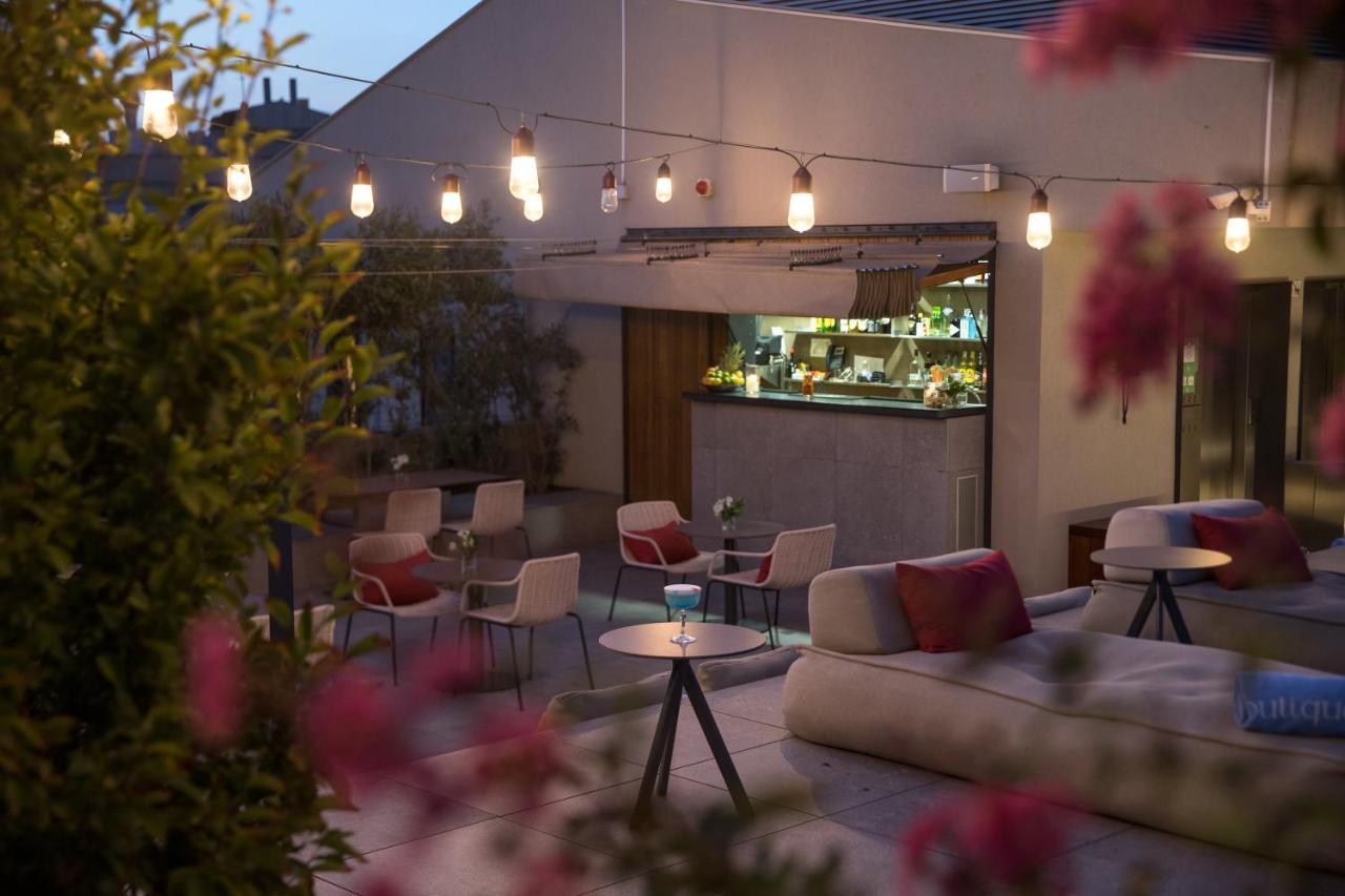 Hotel Ohla Eixample Barcelona Exterior foto The rooftop bar at the Hotel